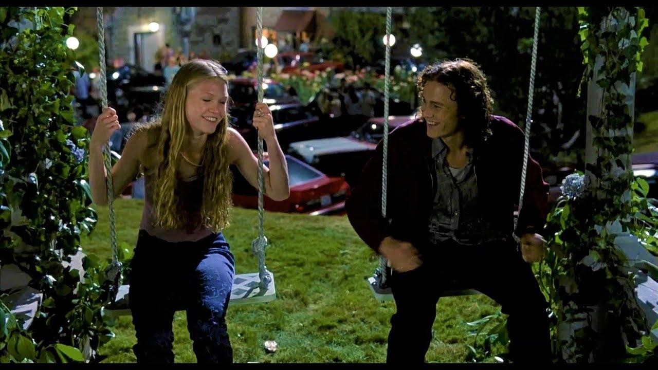 boy and girl on swings